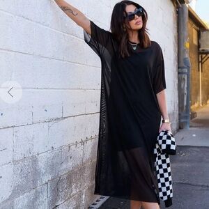 Dressed in LaLa Karma mesh dress